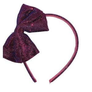 Bands 2 for $10. Purple girls headband with bow